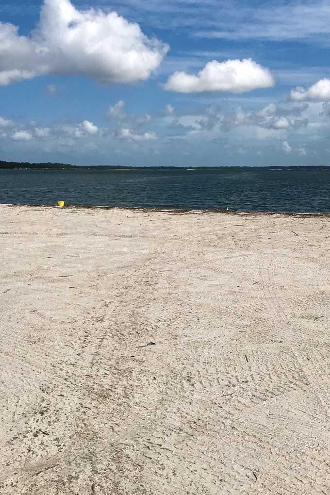 Tire tracks at The Sands Beach in Port Royal, South Carolina 