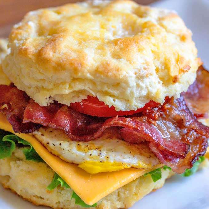 Biscuit breakfast sandwich with bacon, egg and cheese