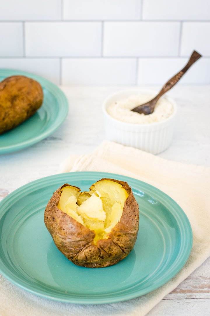 Air fried baked potatoes with butter and truffle salt