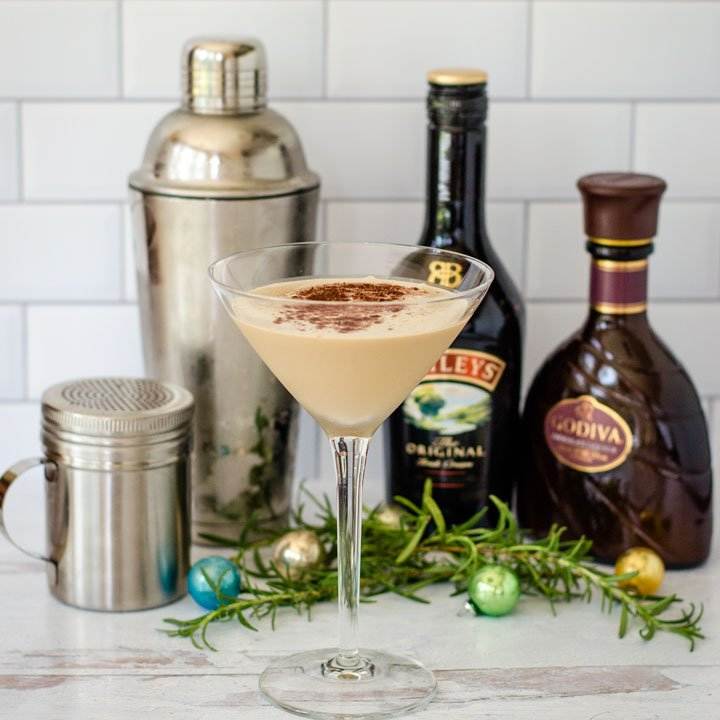 Godiva chocolate martini with Baileys, cocktails shaker and cacao powder