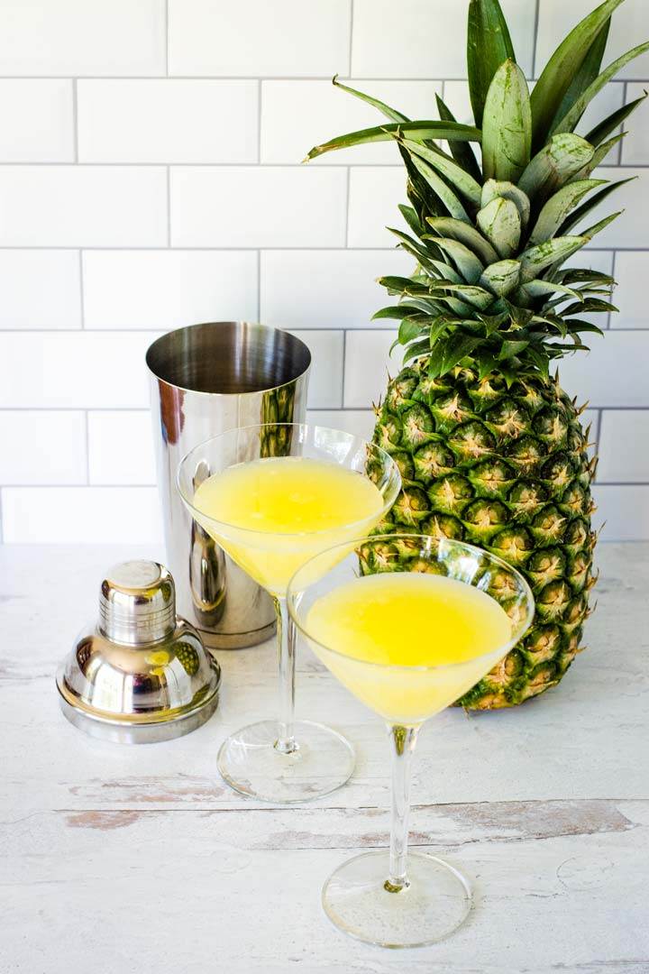 Pineapple drink, cocktail shaker, whole pineapple