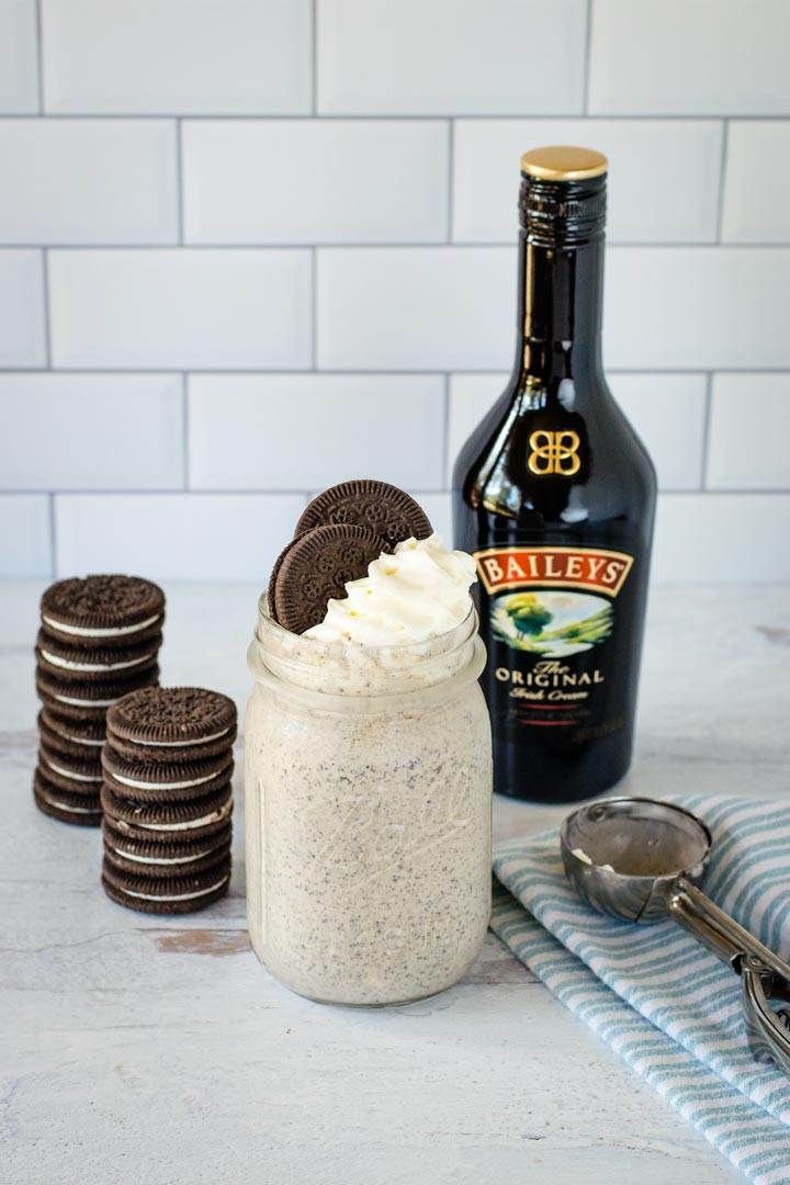 Milkshake with cookies, whipped cream, Bailey, ice cream scoop