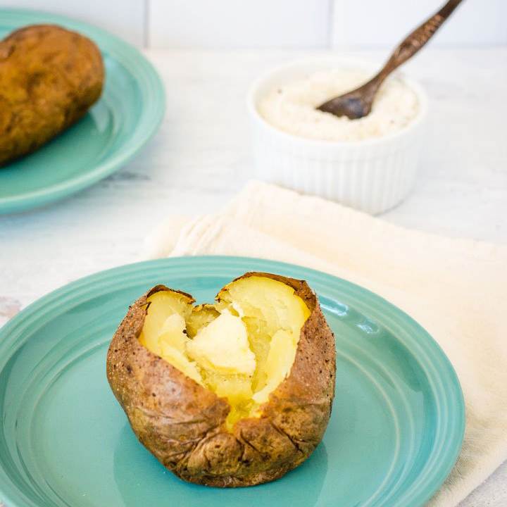 Baked potato with butter and truffle salt