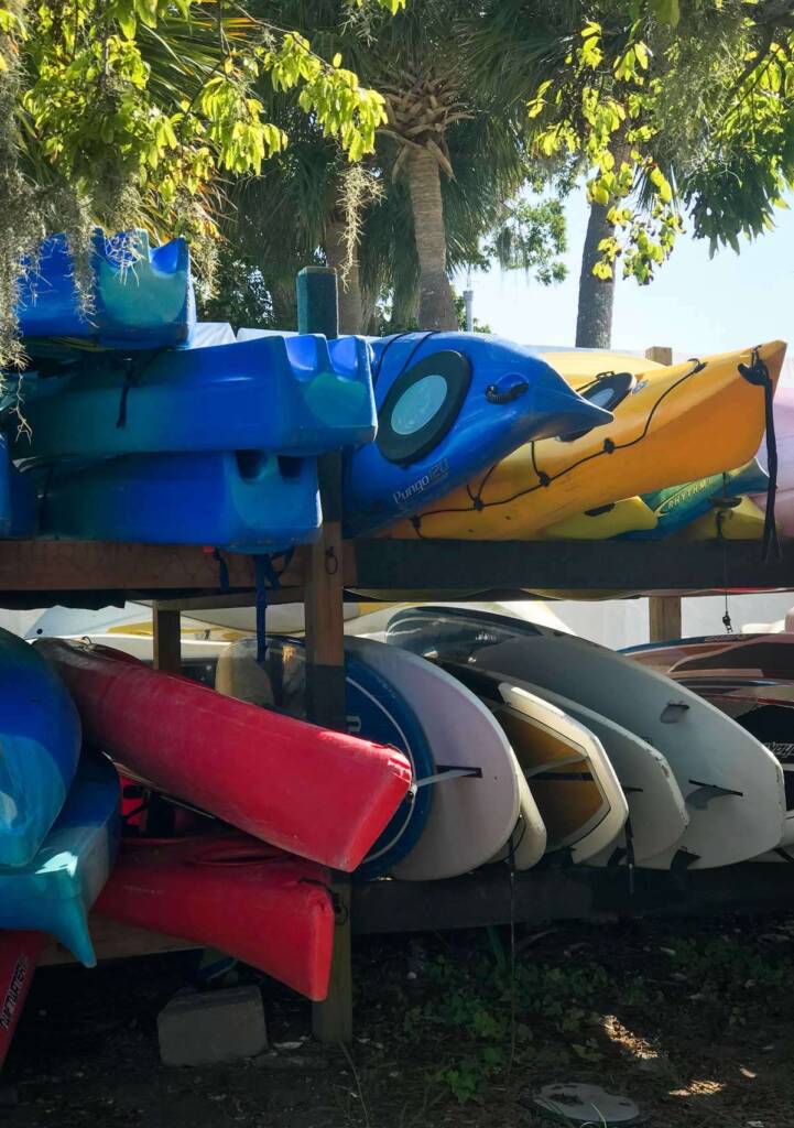 Kayaks and paddle boards on rack