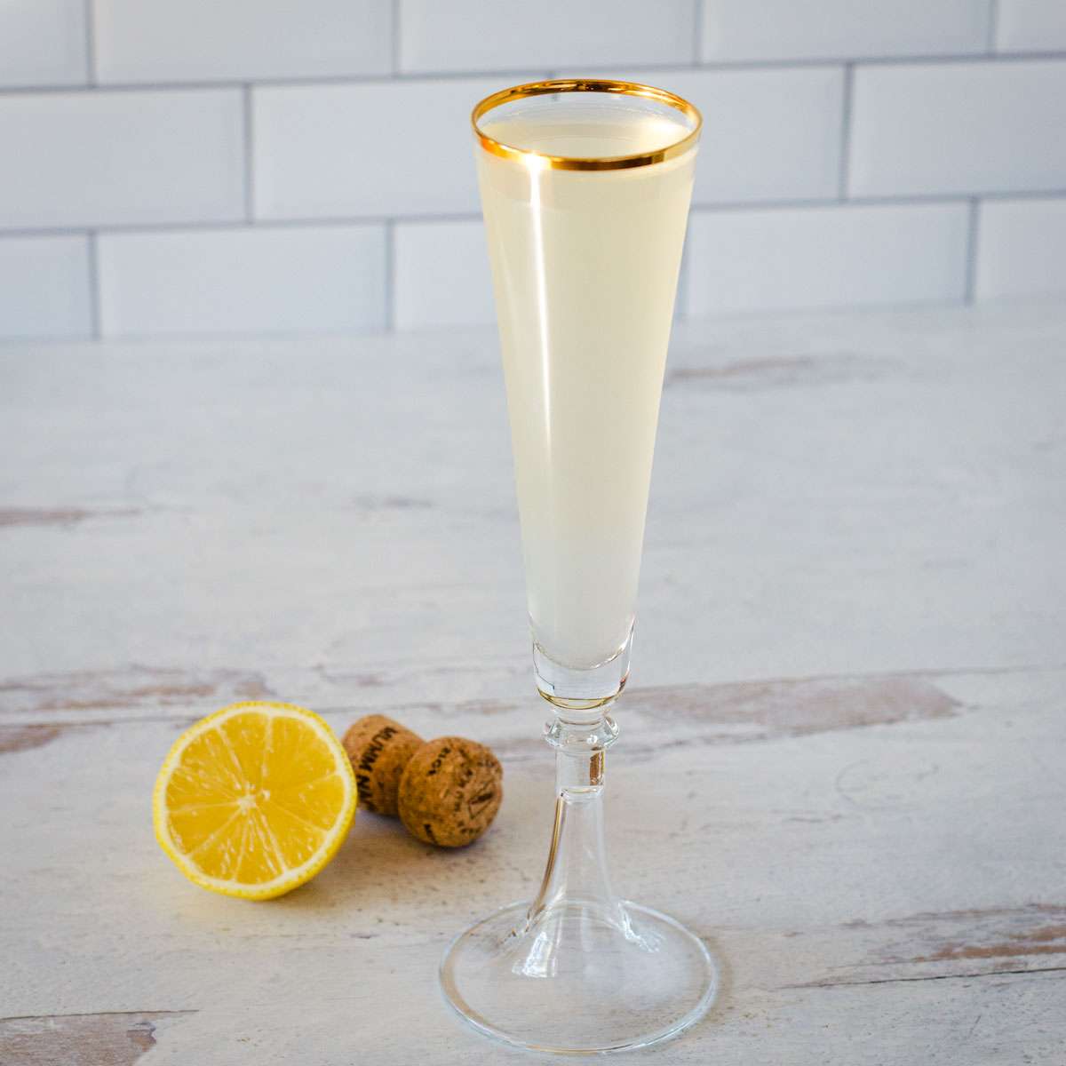 French 76 cocktail with lemon and champagne