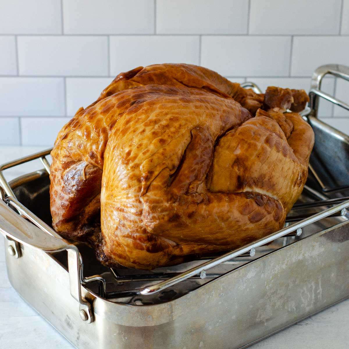 Smoked turkey in roasting pan