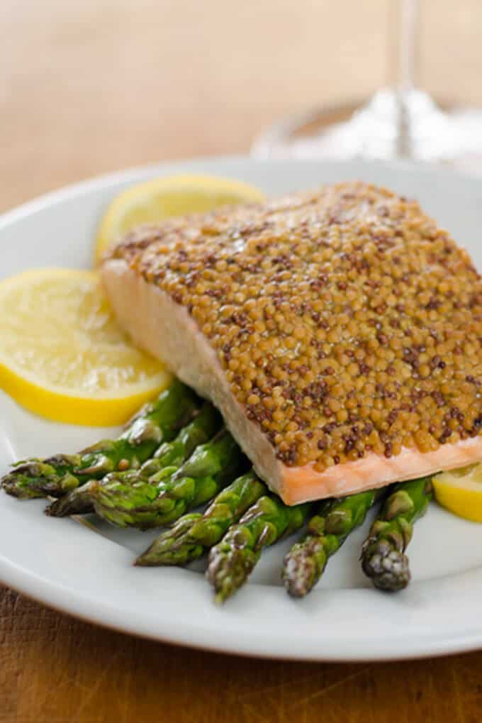 Baked salmon with asparagus and lemon.