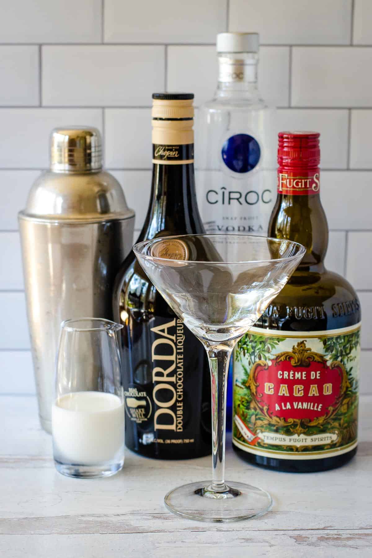 Creme de Cacao, chocolate liqueur, vodka, cream, cocktail glass and shaker