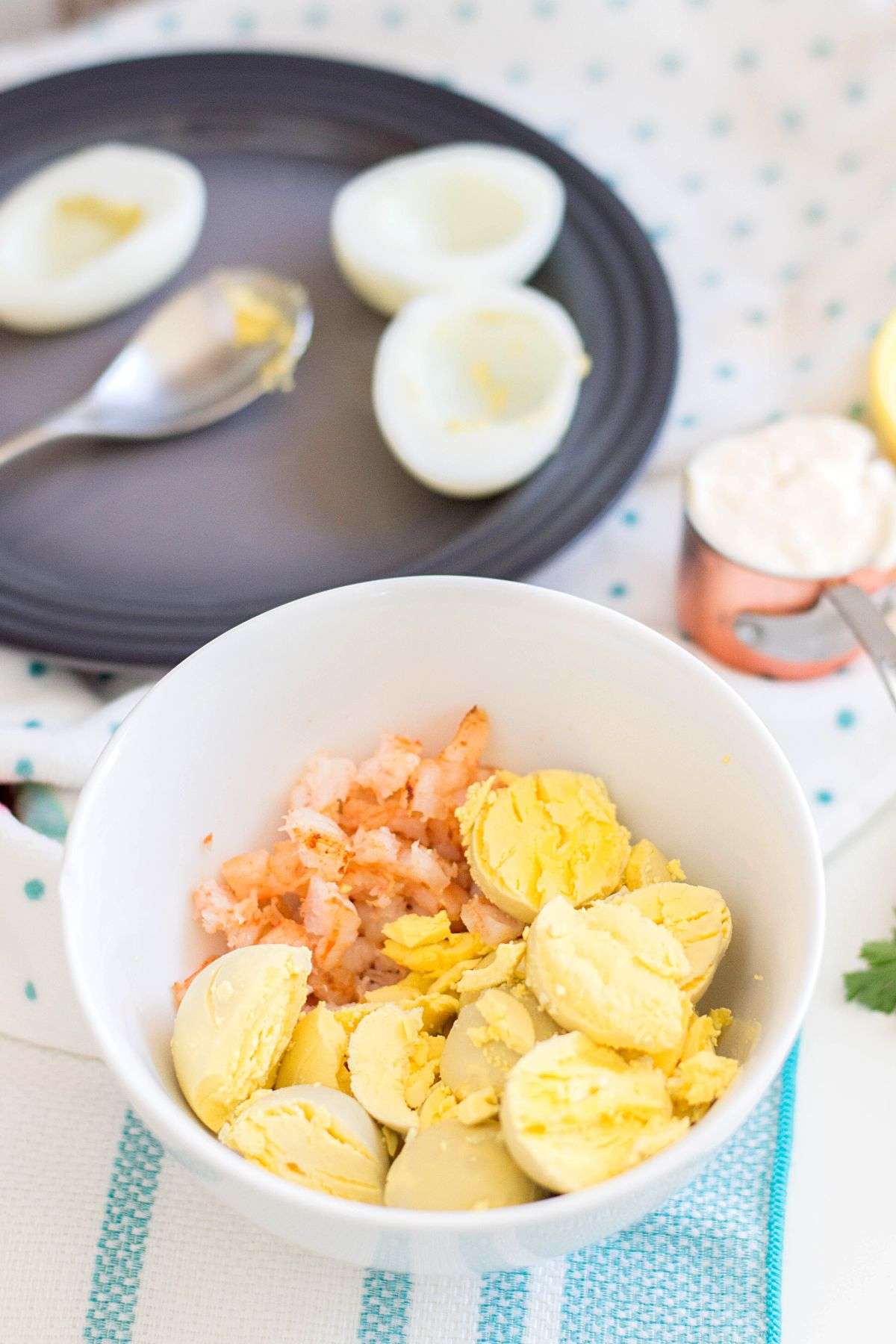 bowl with egg yolks and shrimp