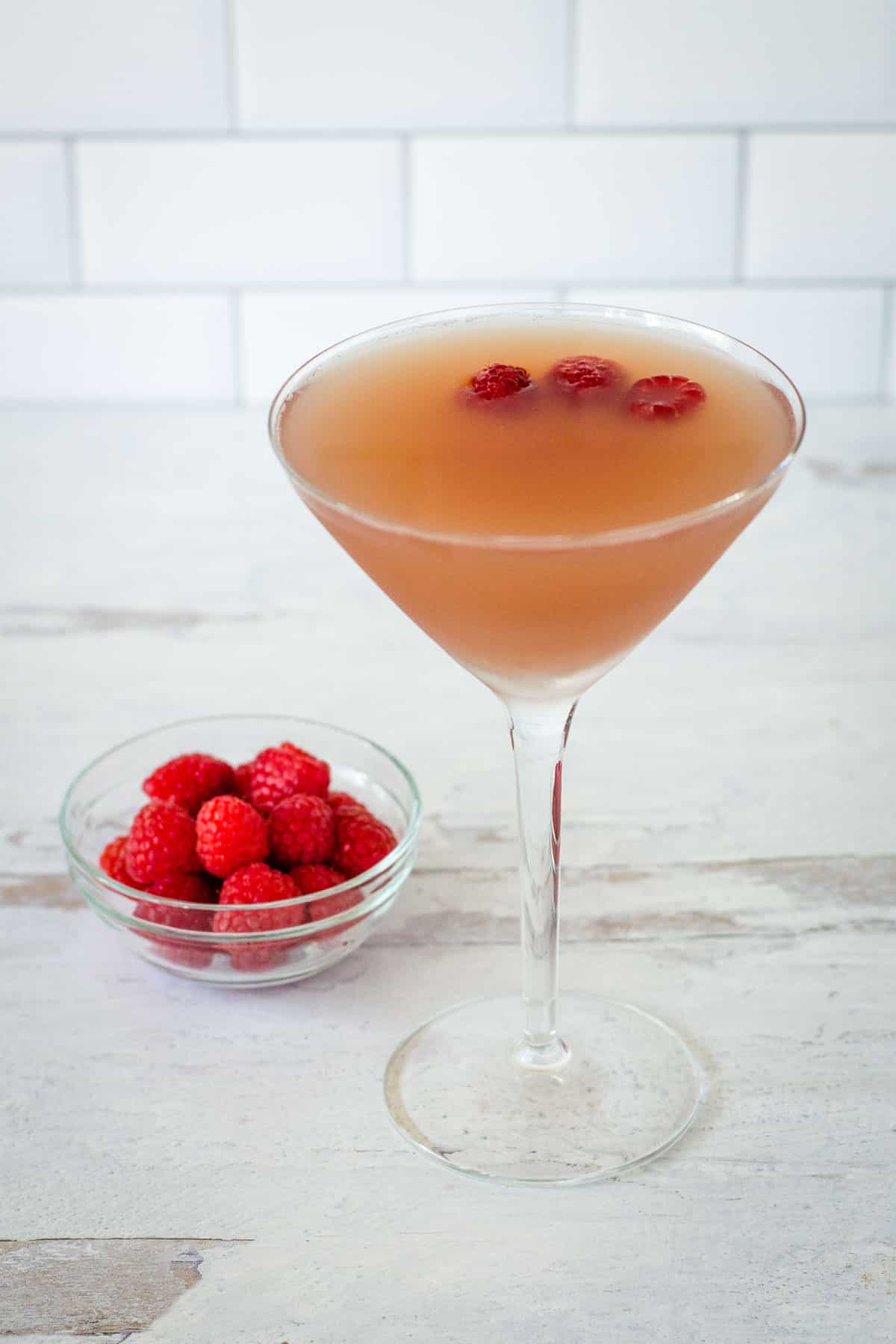 French martini cocktail with raspberries