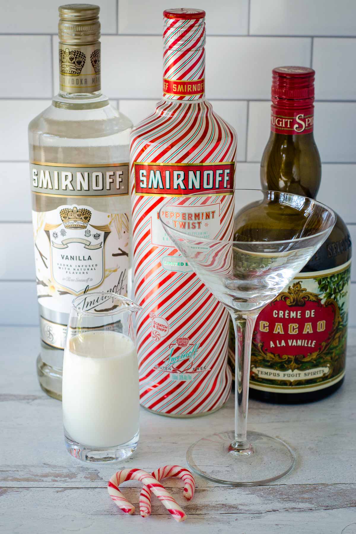 Vanilla vodka, peppermint vodka, creme de cacao, cream and cocktail glass.