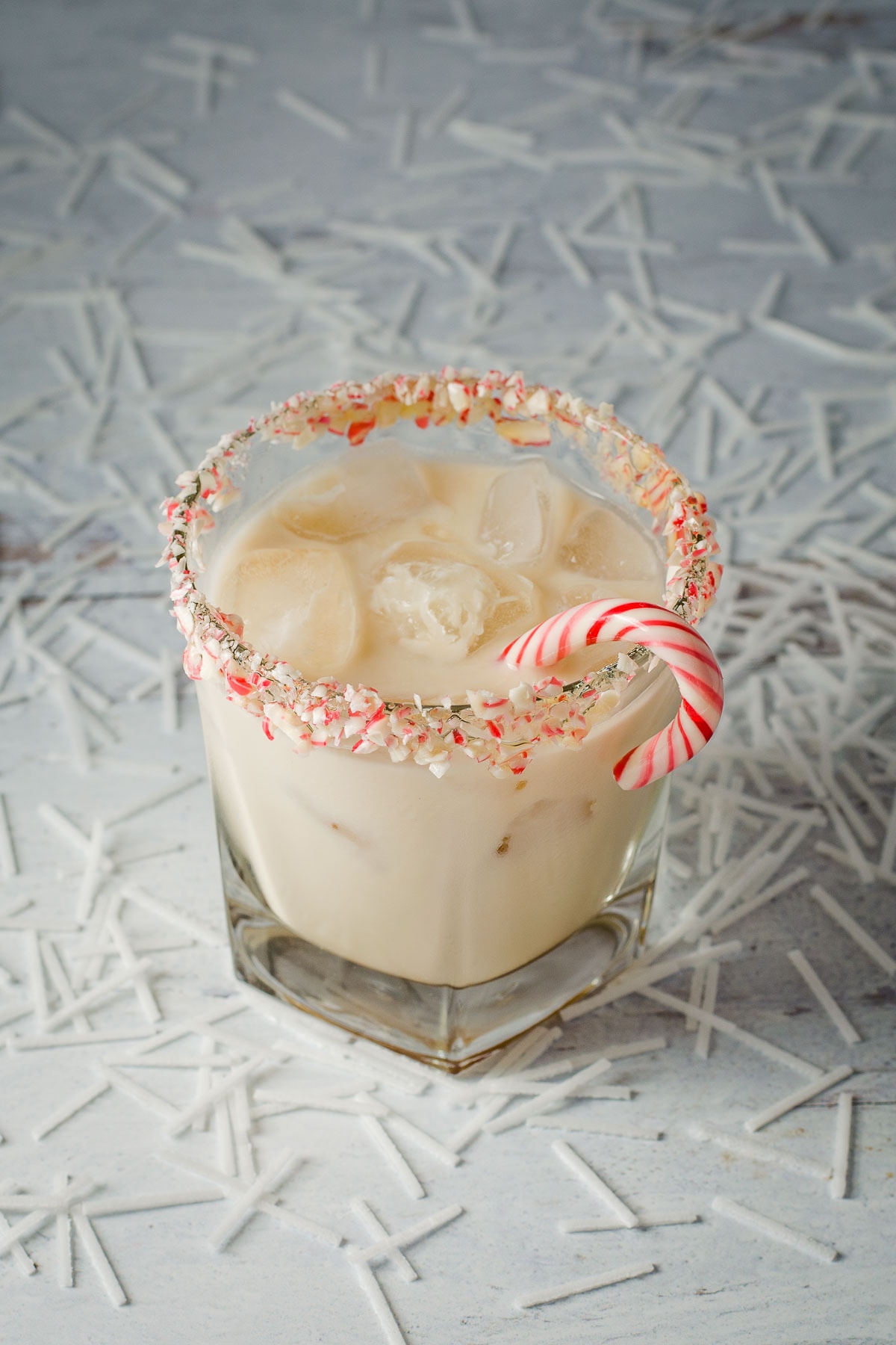 Peppermint White Russian with candy cane.